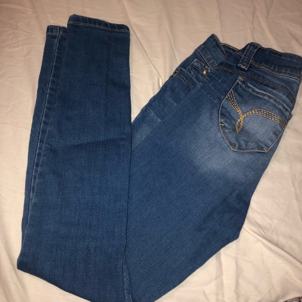WannaBettaButt Mid Rise Jeans